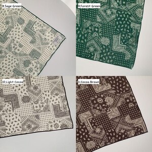 May include: Four square fabric handkerchiefs featuring a repeating paisley and geometric bandana pattern. The colors include sage green, forest green, light cocoa, and cocoa brown. Each piece has a finished edge and a small white brand label.