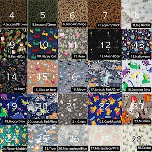 Puede incluir: Una cuadr&iacute;cula de muestras de tela con varios patrones y colores. Los dise&ntilde;os incluyen estampado de leopardo, floral, gato, dinosaurio y temas de Halloween. Cada muestra est&aacute; etiquetada con un n&uacute;mero y un nombre descriptivo.