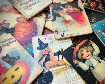 Calamite vintage di Halloween: decorazioni kitsch con streghe, zucche e gatti