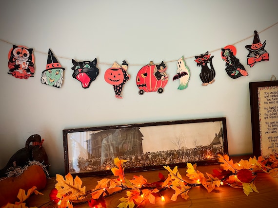 Vintage Halloween Decor Garland Retro Banner Kitsch Pumpkins Witch Ghost Die Cut Spooky Wall Decor Party Decor Handmade Glitter Accents - Etsy Add a touch of nostalgia to your Halloween decor with this vintage-inspired garland featuring die-cut pumpkins, witches, and ghosts. Handmade with glitter accents, this spooky wall decor is perfect for adding a whimsical and retro touch to your Halloween party. Available on Etsy, these kitsch decorations will bring a unique and charming vibe to your celebration.