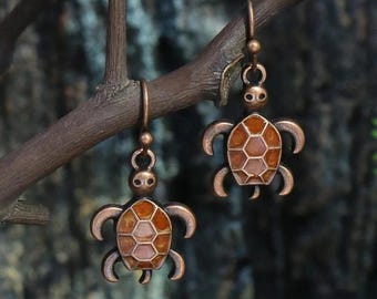 Pendientes con dije de tortuga
