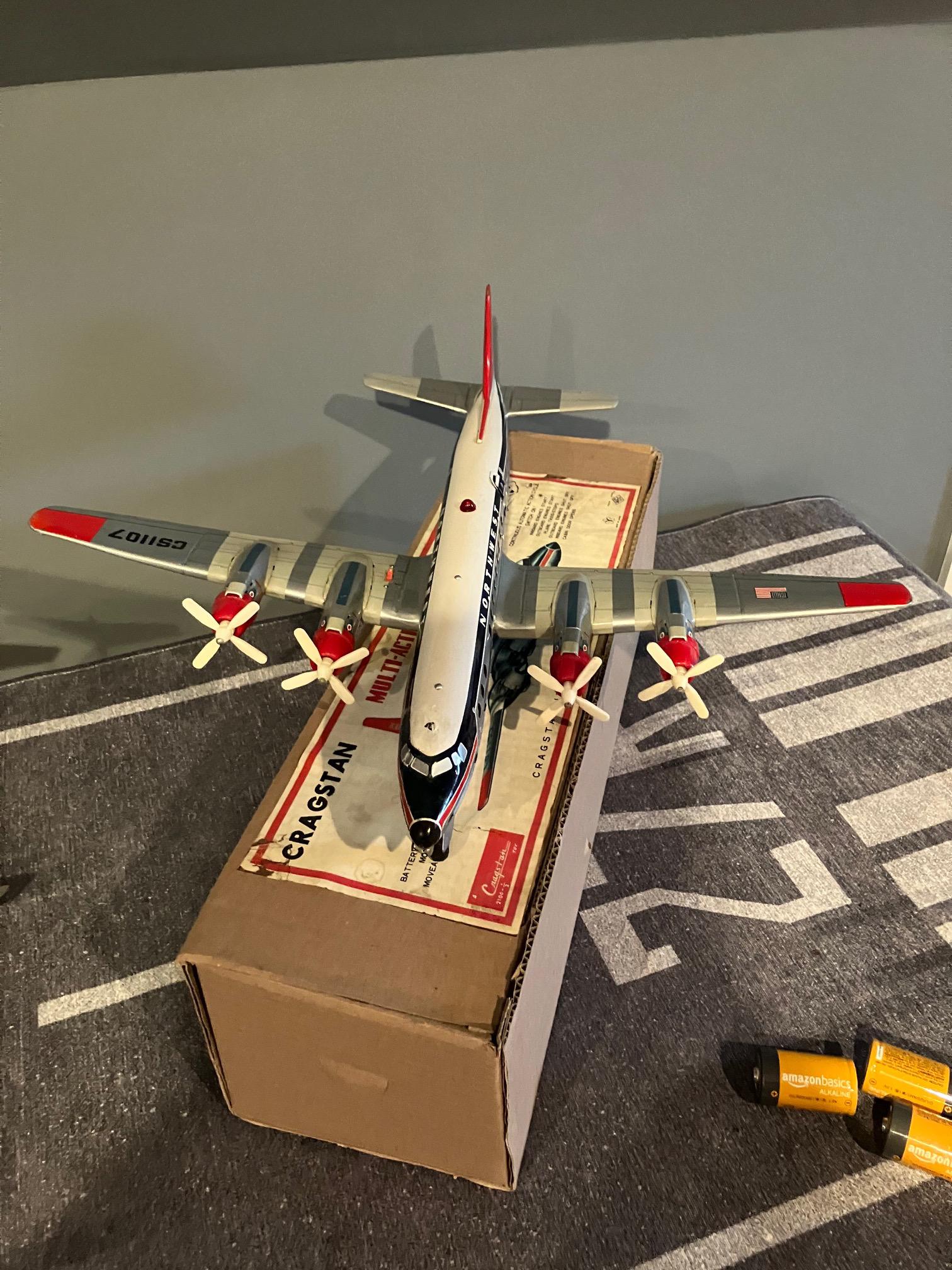 Battery Operated Northwest Airlines DC-7 Multi-action Tin