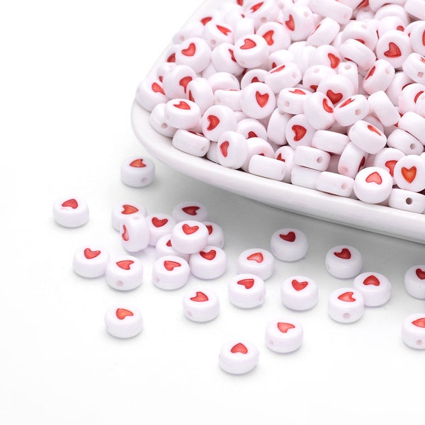 Lot de 50 perles blanche coeur intérieur rouge  7  mm