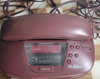 Teléfono y despertador Telemax Vintage, radio reloj AM/FM vintage fabricado en China.