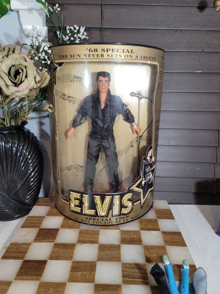 Elvis Doll, '68 Special the Sun Never Sets on A Legend