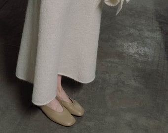 Off white women wool skirt from lightweight alpaca wool blend. A-line shape, high waist. Premium handmade quality.
