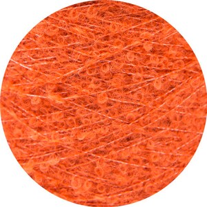 May include: Close-up of a ball of orange yarn with a fuzzy texture.