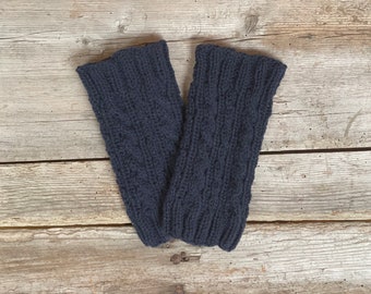 Leg warmers and arm warmers knitted from pure wool with a cable pattern. Dark blue. Wrist warmers, fingerless gloves, hand warmers. Hand knitted