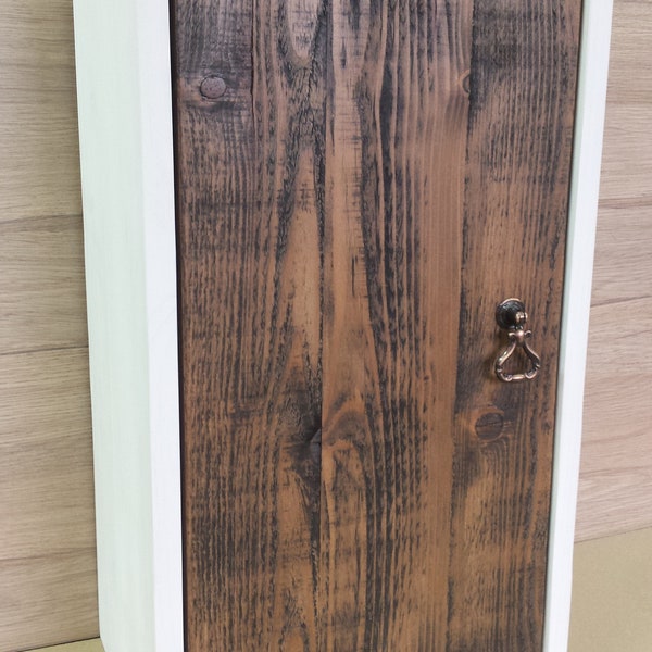 White floating wall cabinet with rustic door