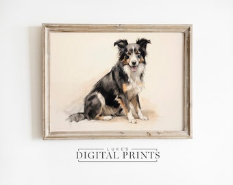 Könnte beinhalten: Ein Aquarellbild eines schwarz-braun-weißen Border Collies, der in entspannter Pose sitzt. Der Hund blickt den Betrachter mit einem fröhlichen Ausdruck direkt an. Das Bild ist in einem hellen Holzrahmen gerahmt.