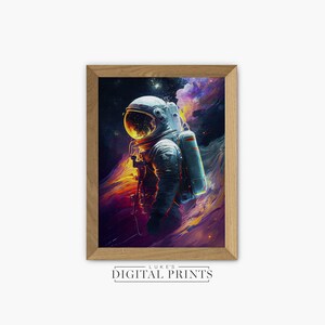 May include: A digital print of an astronaut in a white spacesuit standing in a colorful nebula. The astronaut is facing away from the viewer and has a large oxygen tank on their back. The nebula is a mix of orange, purple, and blue colors.