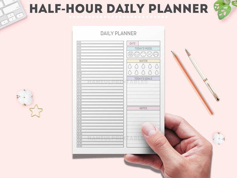 May include: A black and white daily planner with a half-hour time slot schedule. The planner includes sections for date, today's mood, water intake, today's goals, and notes.