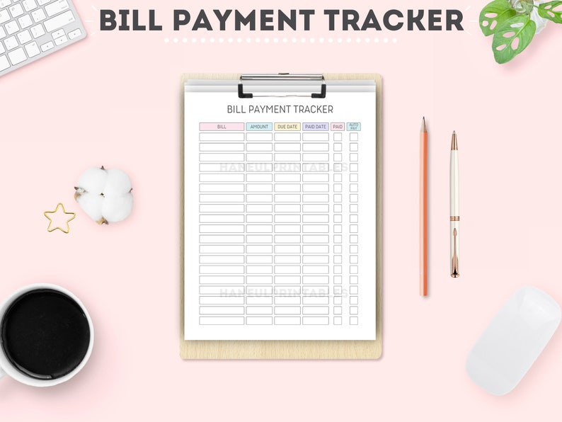 May include: A clipboard with a "BILL PAYMENT TRACKER" form, featuring columns for bill, amount, due date, paid date, and paid status. A pencil, pen, computer mouse, and a cup of coffee are on a pink surface. A keyboard, cotton ball, and star-shaped decoration are also visible.