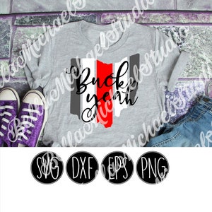 May include: A gray t-shirt with a red, white, and gray outline of the state of Ohio. The text "Buck yeah" is written in black cursive lettering over the state outline.