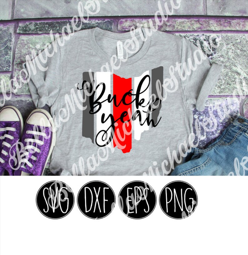 May include: A gray t-shirt with a red, white, and gray outline of the state of Ohio. The text "Buck yeah" is written in black cursive lettering over the state outline.