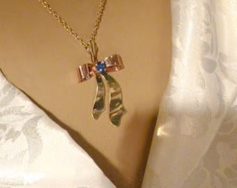 Bow Pendant Two-Tone Gold with Blue Zircon