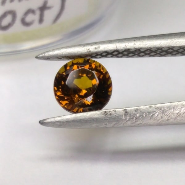 A Rare 0.50ct Round cut Dark Golden Brown MALI Garnet, Loose, Natural, Faceted