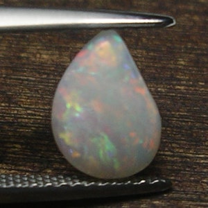 A Gorgeous Unique 0.92ct Loose Fancy Teardrop shape Cabochon Australian Opal