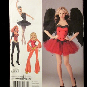 May include: Simplicity sewing pattern number 2067 for sizes 6, 8, 10, and 12. The pattern includes three costume ideas: a black ballerina, a red devil, and a red devil with black wings. The pattern is for costumes that are suitable for Halloween or other events.