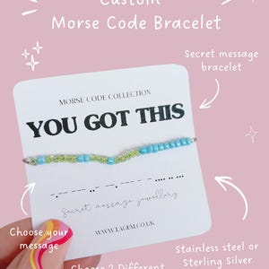 May include: A custom Morse code bracelet with a secret message. The bracelet features blue and green seed beads. The card reads "YOU GOT THIS" and "Choose your message". Available in stainless steel or sterling silver finish.