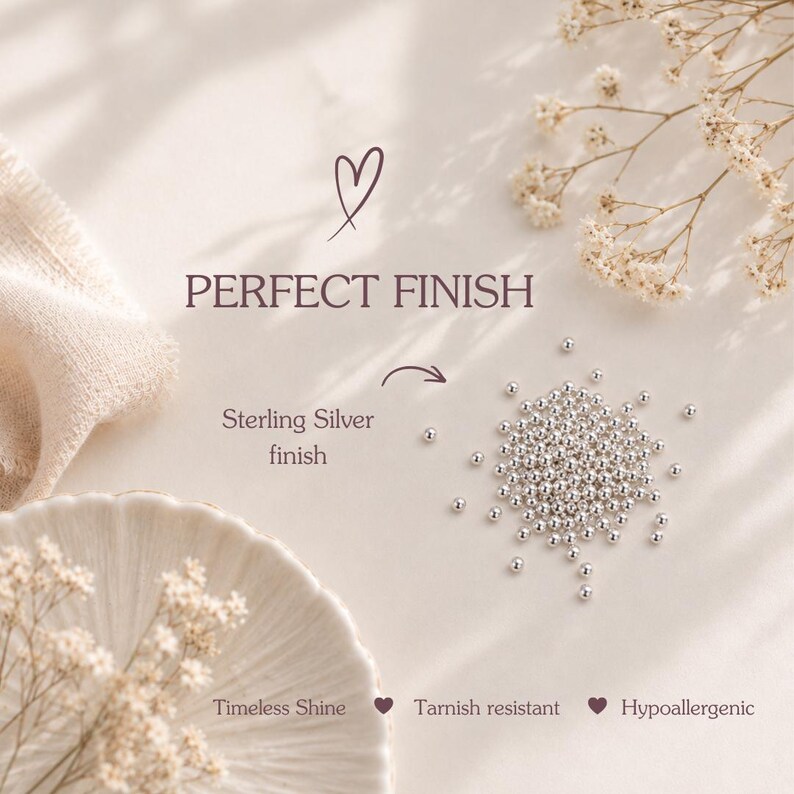 Puede incluir: Una colecci&oacute;n de peque&ntilde;as cuentas met&aacute;licas plateadas con acabado en plata de ley. El texto en la imagen dice: PERFECT FINISH, Sterling Silver finish, Timeless Shine, Tarnish resistant y Hypoallergenic, acompa&ntilde;ado de iconos de corazones.