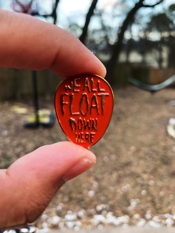 We All Float Enamel Pin