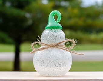 Small Glass Snowman with a Green Hat