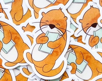 Sticker Otter & Book Reading Vinyl Sticker | 1.27" x 2" | DISHWASHER SAFE | Weather Proof | Laptop + Kindle