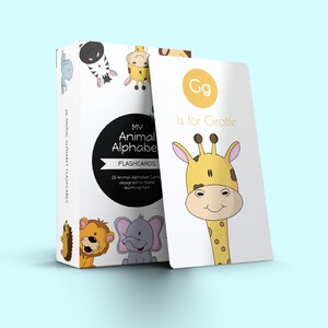 May include: A set of 26 alphabet flashcards featuring colorful illustrations of animals. The card shown is yellow and white and features a cartoon giraffe with the text "Gg is for Giraffe".
