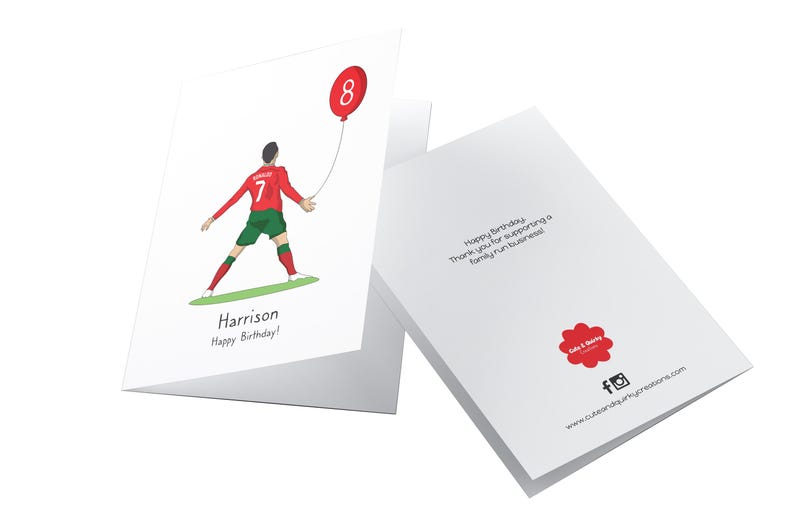 May include: A white card with a cartoon illustration of a soccer player holding a red balloon with the number 8 on it. The card says "Harrison Happy Birthday!" on the front and "Happy Birthday Thank you for supporting a family run business" on the back.