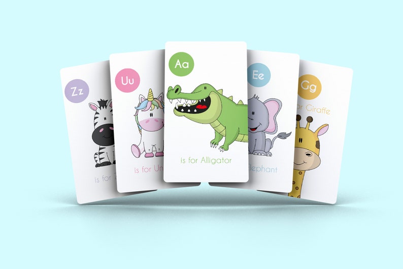 May include: Five colorful flashcards with letters of the alphabet and corresponding animals. The letters are Aa, Uu, Ee, Zz, and Gg. The animals are an alligator, a unicorn, an elephant, a zebra, and a giraffe.