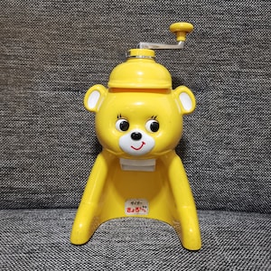 vintage japanese toys big eye bear eyes rolled around ice shaker retro kawaii showa Yellow bear spinning ice japan