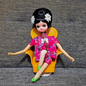vintage pose doll japanese Big eyes black hair Chinese girl doll sitting in a chair music box sankyo japan toys