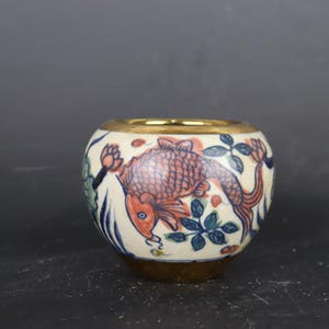 Chinese old ceramic pot, gold ground Blue and white Doucai porcelain tea jar hand drawing lotus flower and fish pattern