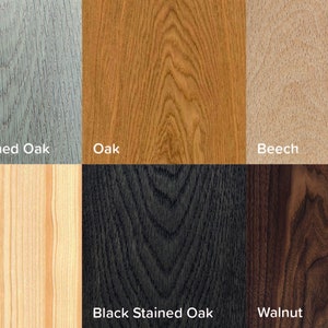 May include: Six wood samples showing different wood grains and colors. The samples are labeled: White stained Oak, Oak, Beech, Pine, Black Stained Oak, and Walnut.