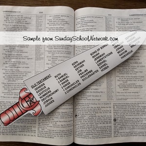 May include: A red and white bookmark shaped like a sword with the words "Old Testament" and a list of books of the Bible printed on it. The bookmark is open to a page in a Bible with the text "Lamentations 1:13" and "Lamentations 2:1".