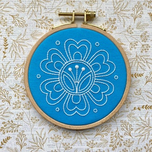 White folk flower outline on blue fabric, 4.5” floral hand embroidery, Original hand embroidery, Slovak folk art, European embroidery art