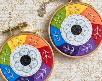 Embroidered rainbow folk evil eye charm, 3” original hand embroidery- protects against life’s bullsh*t :D