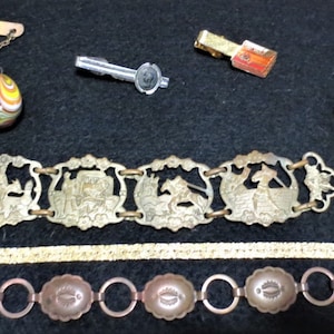 Lot of Unique Jewlry pieces. Armour Hot Dog Clip. Don Quixote, Indian Chief, Bicentennial, Bracelets, Copper