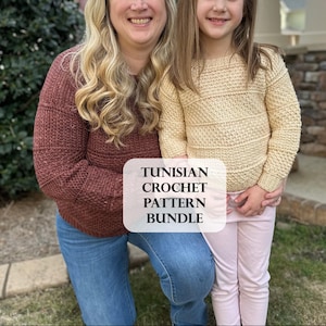 May include: A woman and a child wearing handmade crochet sweaters. The woman's sweater is a deep red-brown, while the child's is a light yellow. The image includes the text "TUNISIAN CROCHET PATTERN BUNDLE".