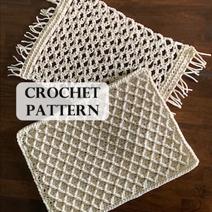 May include: Two crocheted placemats in a cream color with a diamond pattern. The placemats have fringe on the edges. The text "CROCHET PATTERN" is written in black on a white background.