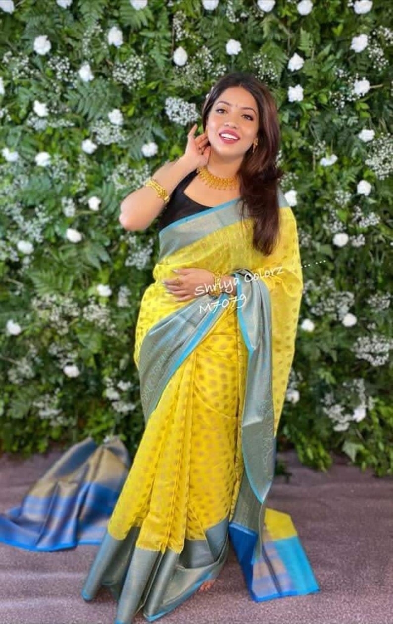 Women Soft Kanjiwaram super all over weaving litchi silk saree