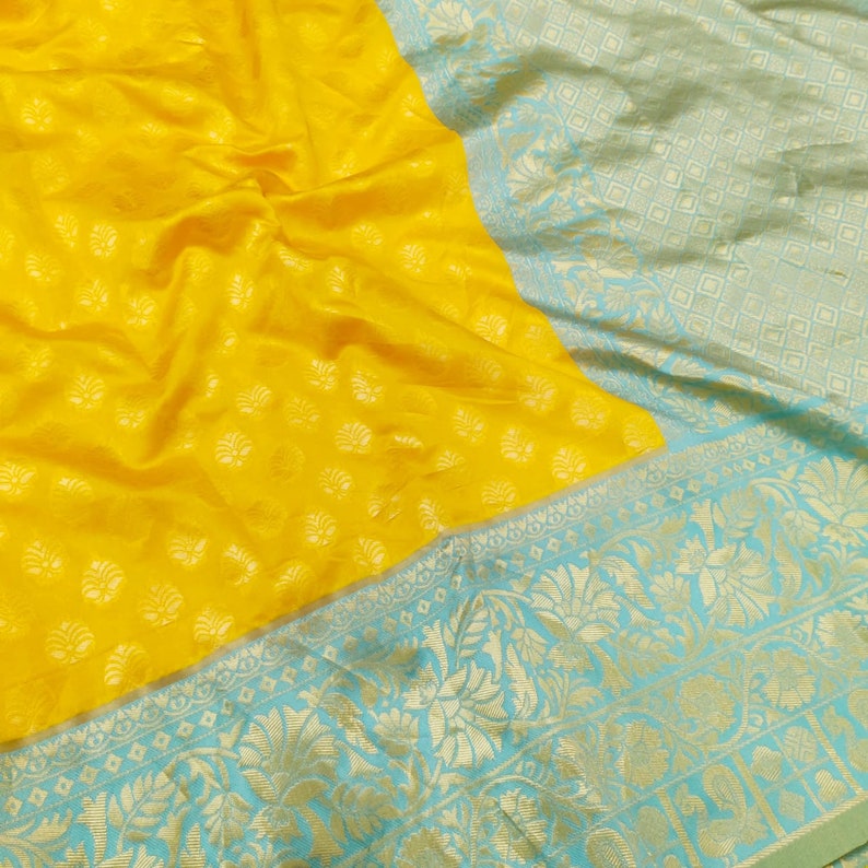 Women Soft Kanjiwaram super all over weaving litchi silk saree