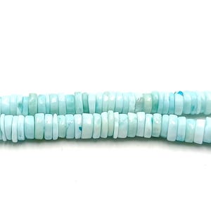May include: Two strands of light blue, flat, round beads. The beads are a pale, seafoam color with subtle variations. The beads are strung together, creating a necklace or bracelet.