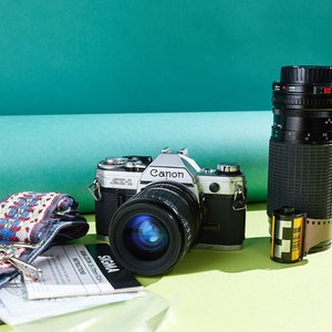 Film and Battery included - Canon AE1 35mm SLR Film camera kit with 2 zoom lenses - beginners film camera full package