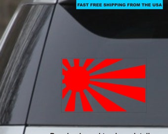 May include: A red Japanese rising sun decal sticker on a gray car window. The decal is enlarged to show detail. FAST FREE SHIPPING FROM THE USA.