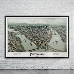 May include: An antique map of Pittsburgh, Pennsylvania from 1893. The map shows the city's layout with rivers, bridges, and buildings. The map is in a black frame.
