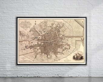 May include: A vintage map of the City of Dublin, Ireland, showing detailed streets and landmarks. The map is printed in black and white on cream-coloured paper. The title "A Plan of the City of Dublin" is printed at the top of the map.