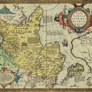 May include: An antique map of Tartaria, a historical region in Asia, with detailed borders and text in Latin. The map is framed in gold and features a compass rose and a decorative cartouche with the text "Tartariae sive Magni Chami Regni".
