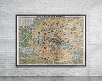 May include: A vintage map of Paris, France, titled "Nouveau Plan de Paris Monumental." The map is printed in black, brown, blue, and green ink on a cream-colored background. The map shows the layout of the city, including the Seine River, major streets, and landmarks.